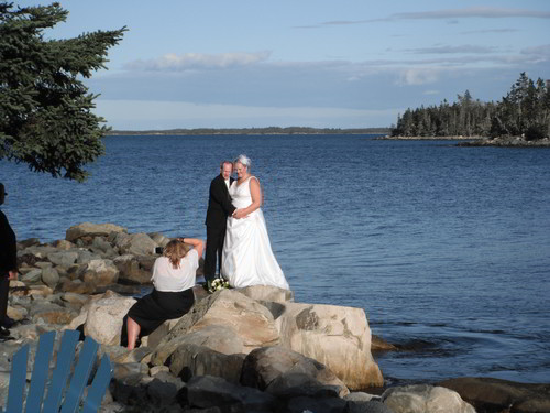 wedding-photos-being-taken-on-the-point-murphys-camping-nova-scotia-2011-500px